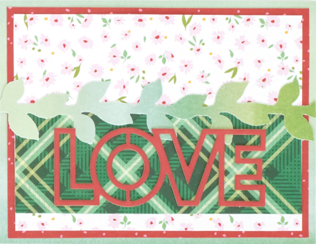 Floral themed card with a large Love embellishment.