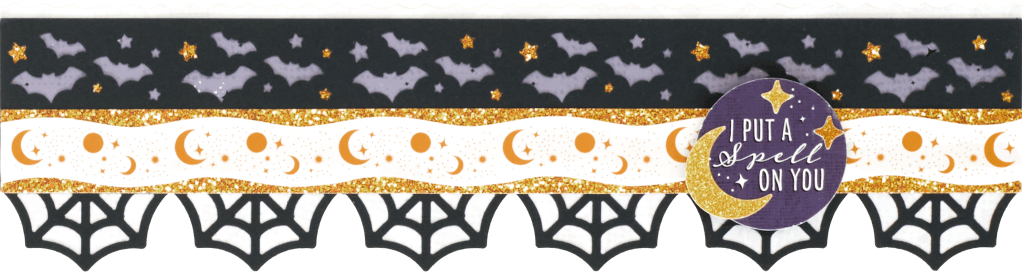Horizontal Halloween border with bats and stars, moon and stars and spider web borders layered together with a sticker cluster on top.