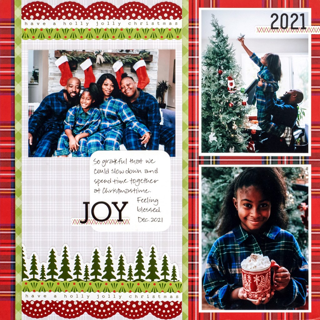 Christmas layout with three photos of a family decorating a Christmas tree and sitting by their stockings.
