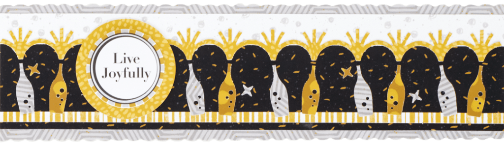 New Year's themed scrapbook border with champagne bottle punch outs and stickers.