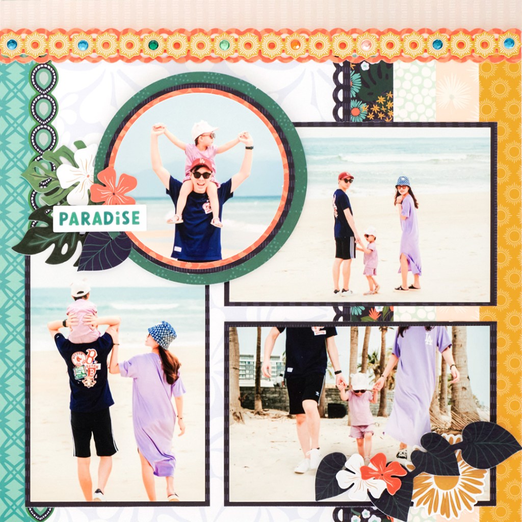 Tropical scrapbook page with four photos and stickers.