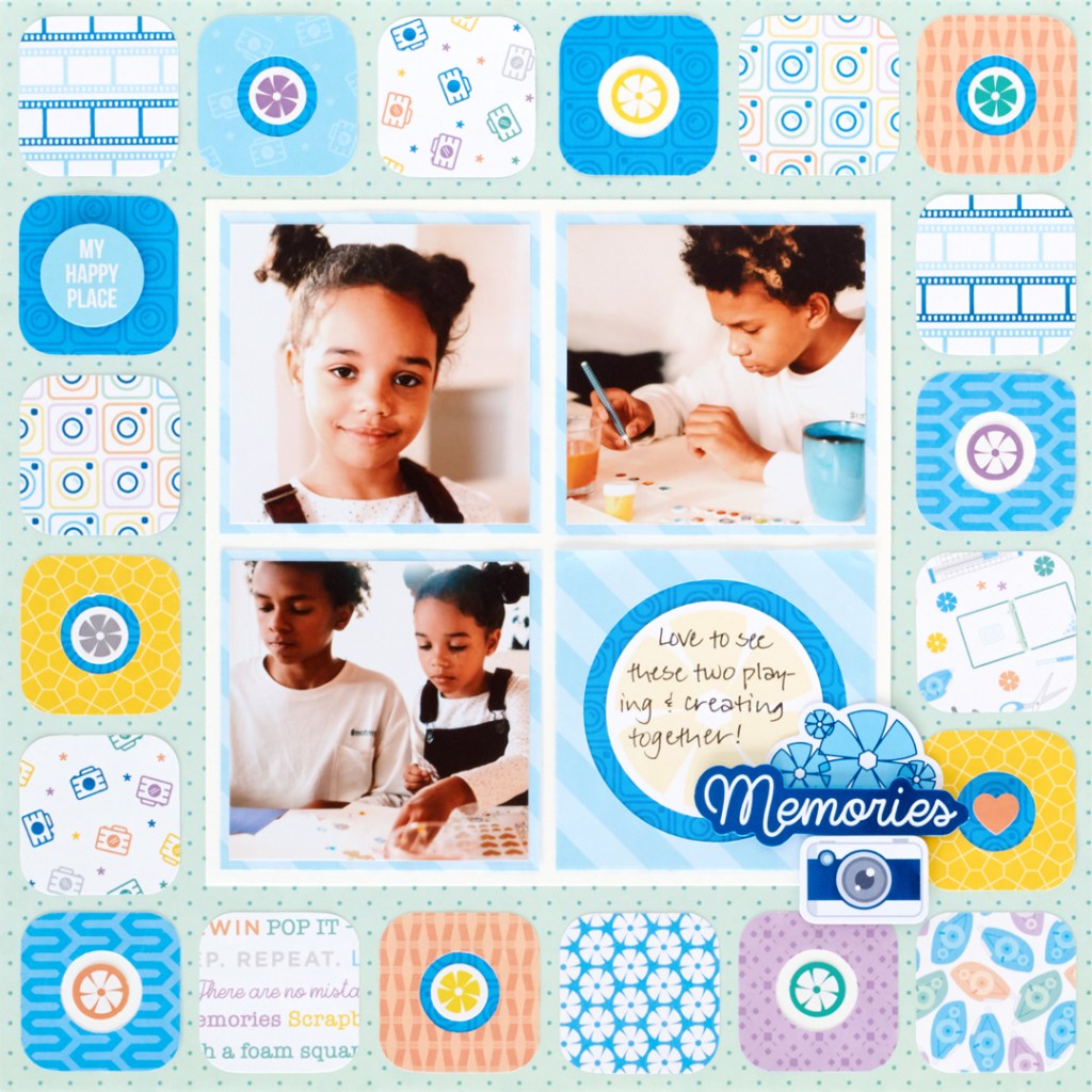 Scrapbooking-themed page layout with photos of children doing arts and crafts, journaling, stickers and a decorative border around the outside frame of the page.
