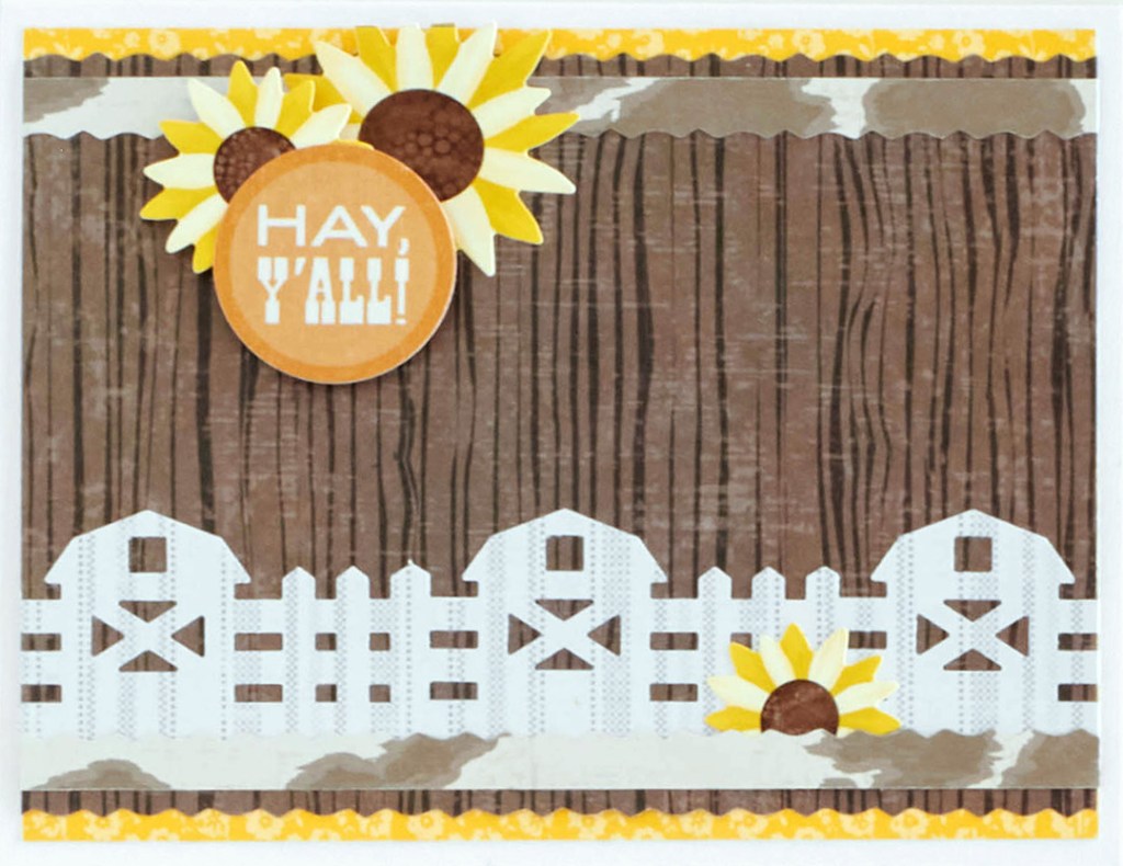 Greeting card using the Barn & Fence Border Maker Cartridge, woodgrain paper and sunflower stickers.