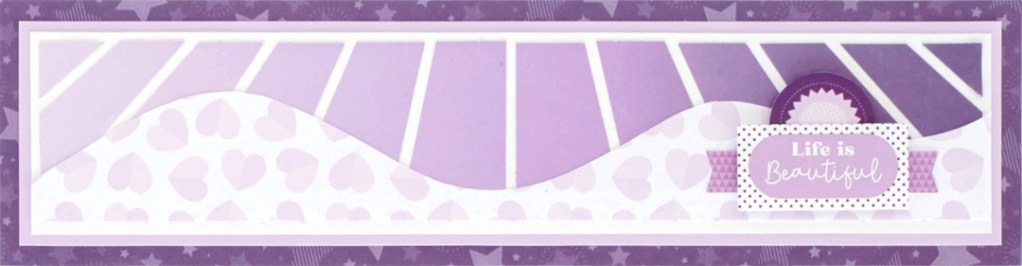 Purple scrapbook border with layered stickers.