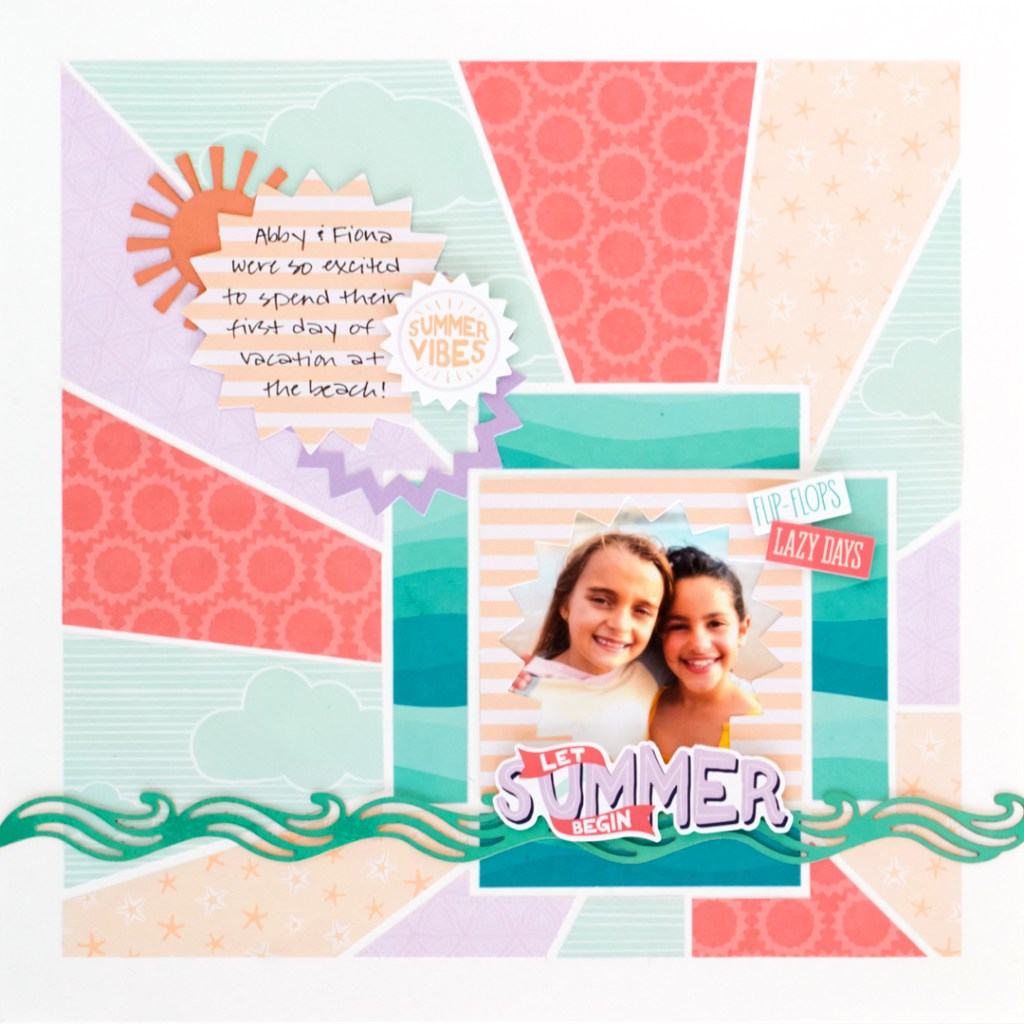 Summer scrapbook layout with paper arranged in a sunburst design placement, photo of two girls on the beach and embellishments.