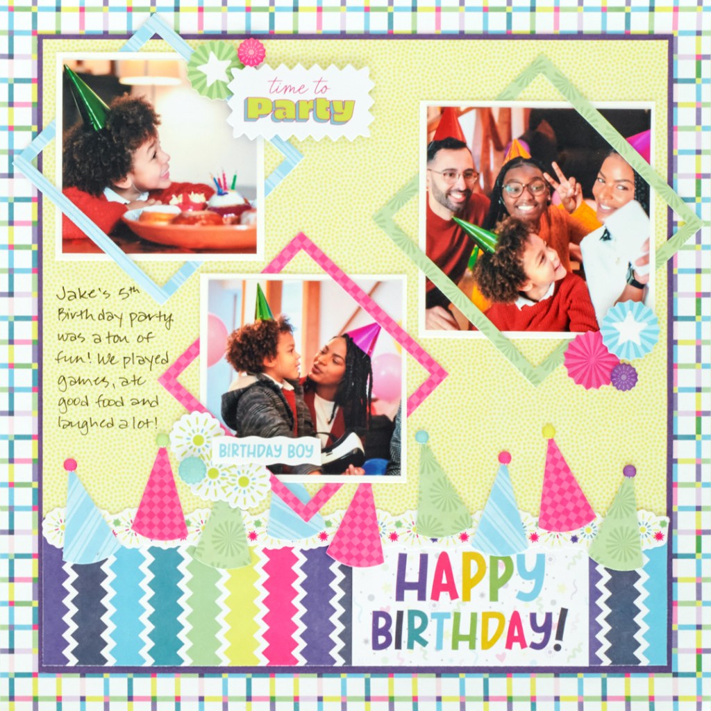 Birthday-themed layout with three photos, decorative paper party hats and stickers.