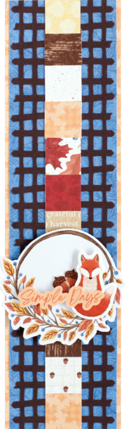 Autumn-themed scrapbooking border with a title sticker and fence-shaped border punch outs.