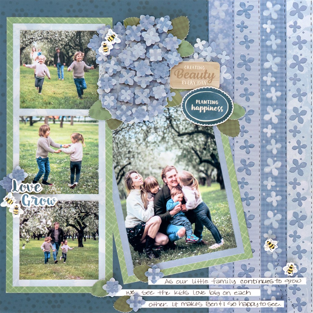 A scrapbook page featuring a collage of family photos showing children playing in a park. The background includes decorative blue and green patterns with paper flowers and bees. Text elements express themes of love, growth, and family happiness.